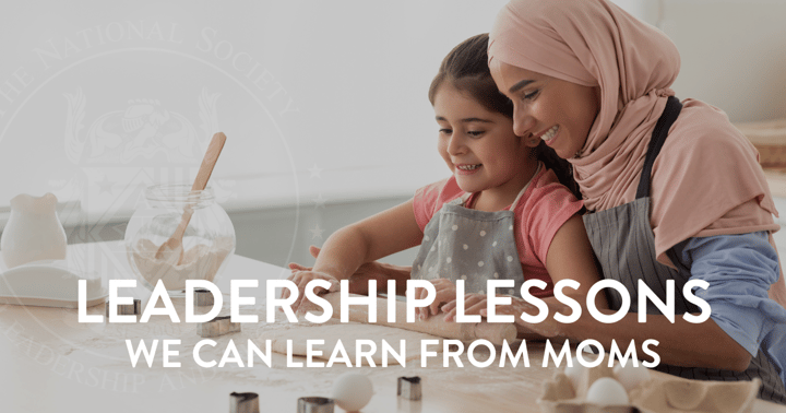 Mom teaching daughter how to bake and showing her the leadership skills of patience and teamwork